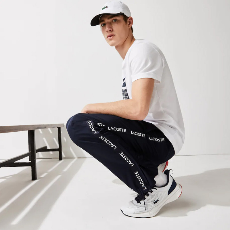 pantalon de survêtement lacoste sport léger avec bandes imprimées